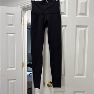 Lululemon black high rise tight, size 4